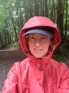 Author waking in a rainy forest